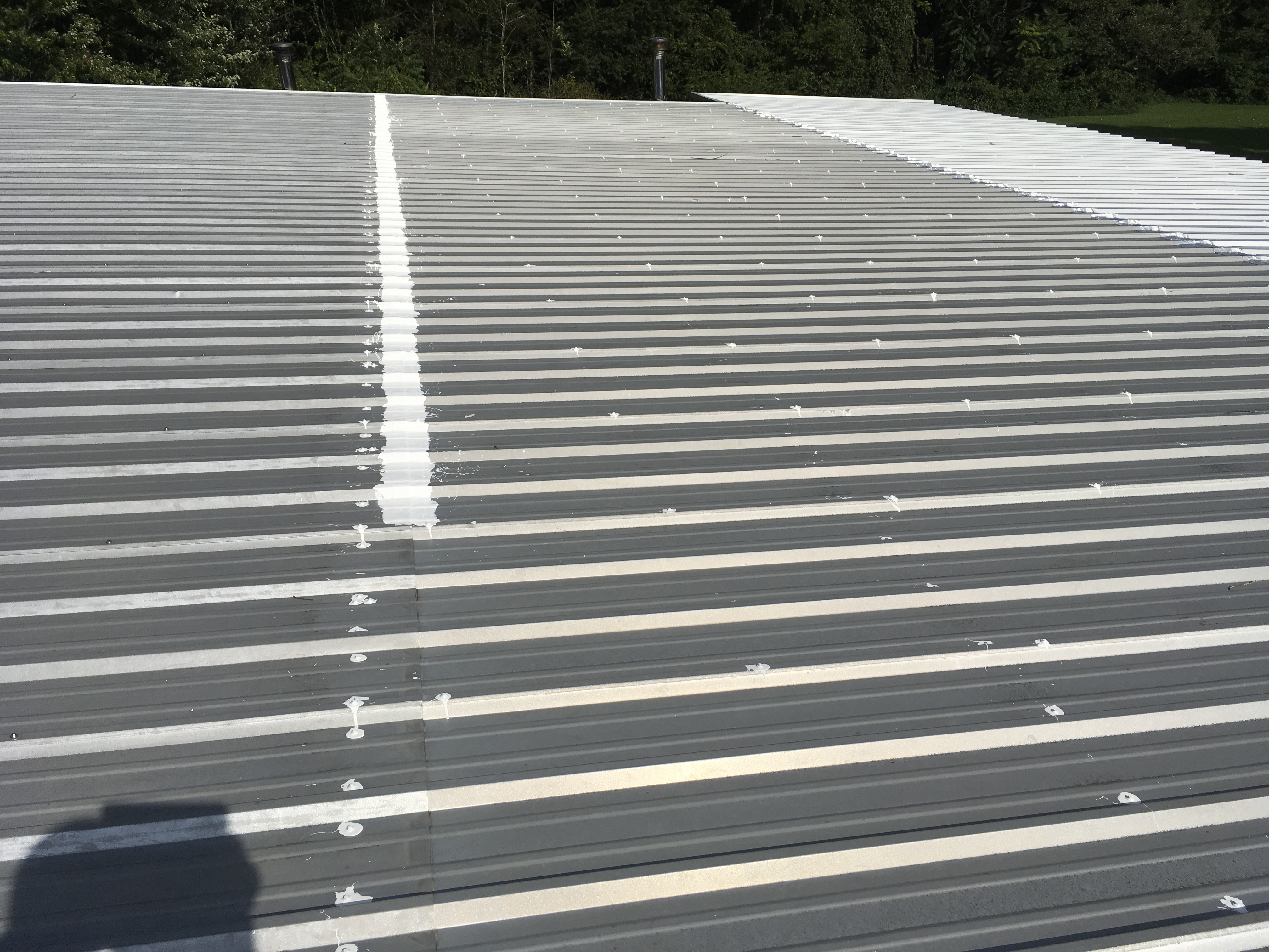 Customer photo: metal roof seam begun with Super Silicone Seal.