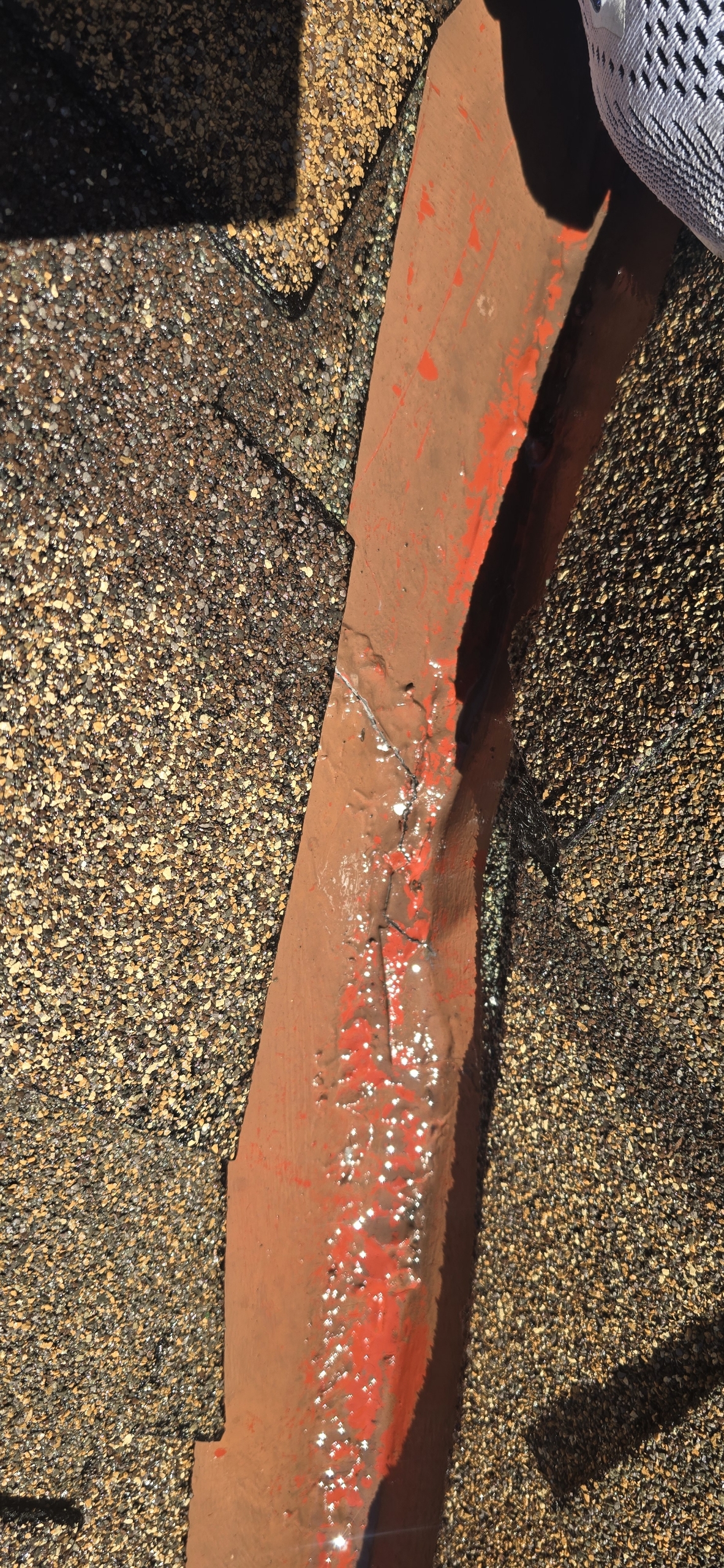 Customer photo: closer view of the existing joint. The customer identified this as copper flashing.
