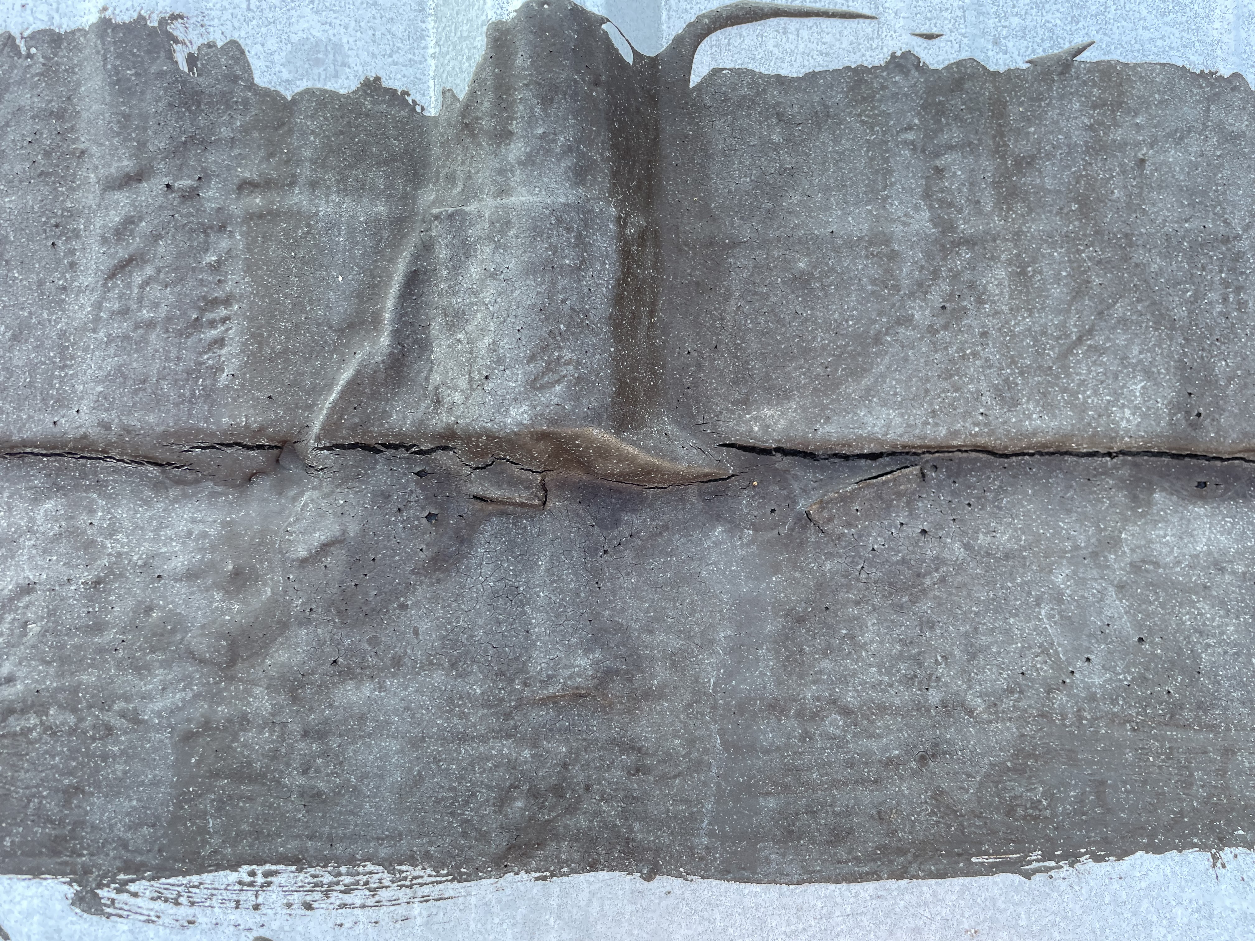 Second customer view of the reported cracking; the cause was not confirmed.