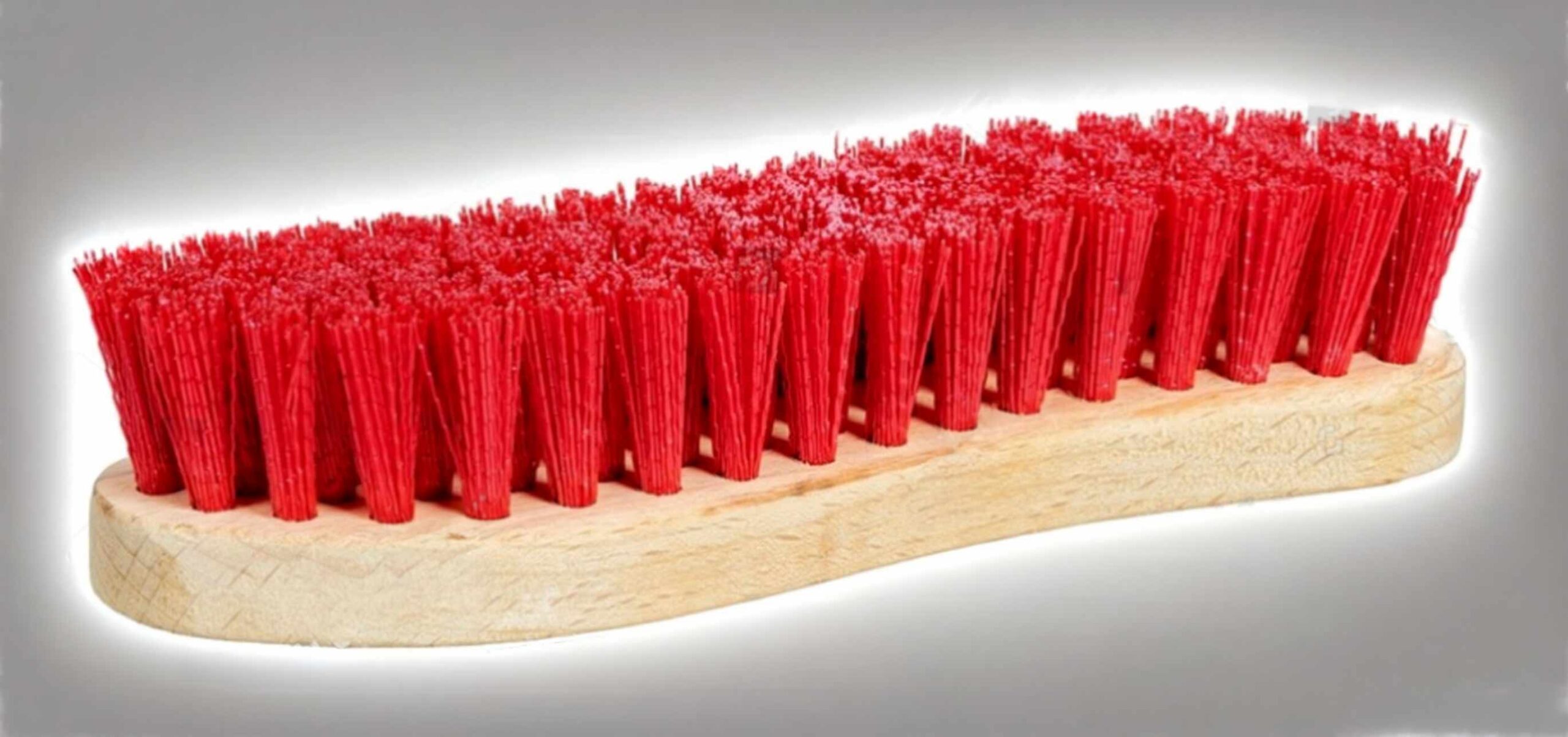 Stiff-bristle hand brush for cleaning roof seams