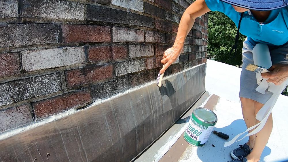Remove loose paint with wire brush